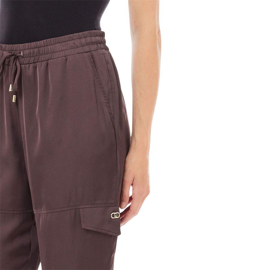Pantaloni tuta da donna jogging in raso stampato Liu Jo | TA5293TS96491016